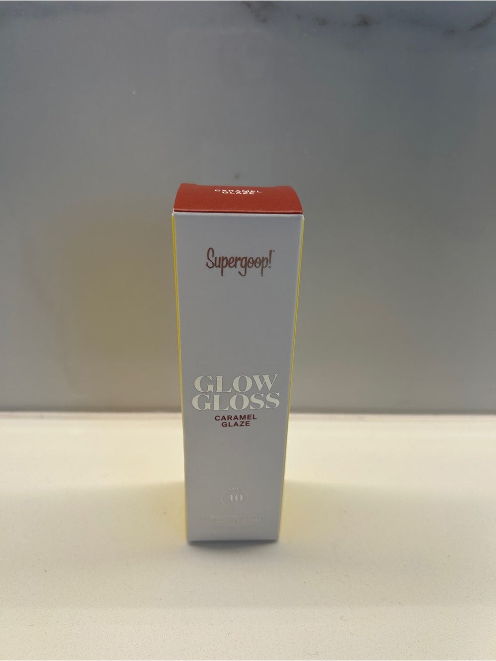 Supergoop! Glow Gloss Lip Gloss - Caramel Glaze (Red, Yellow)